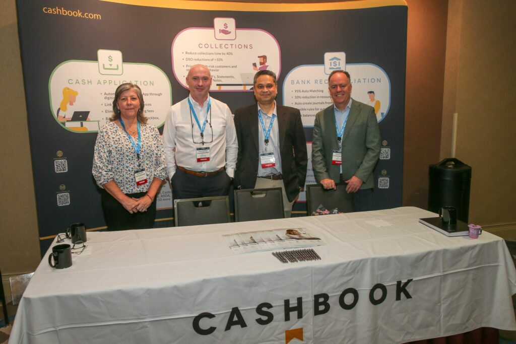 Platinum September for Cashbook: Denise Mills, Tony Cantillon, Haroon Panezai and Greg Coulter at the TIMS User Group Conference.